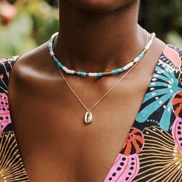 Sashi Jewelry - Sashi Gold Tone Shell Necklace